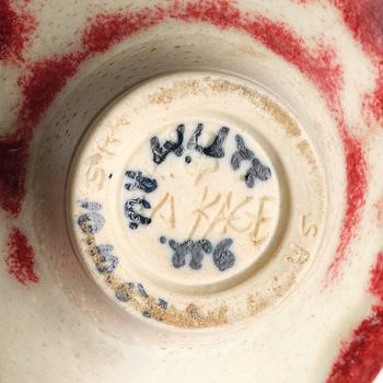 Wilhelm Kåge, a stoneware bowl, Gustavsberg Studio 1957, a vase and a dish, Kåge verkstad, with experimental glazes, mid 20th C.