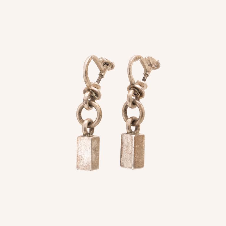 A pair of silver earrings by Wiwen Nilsson.