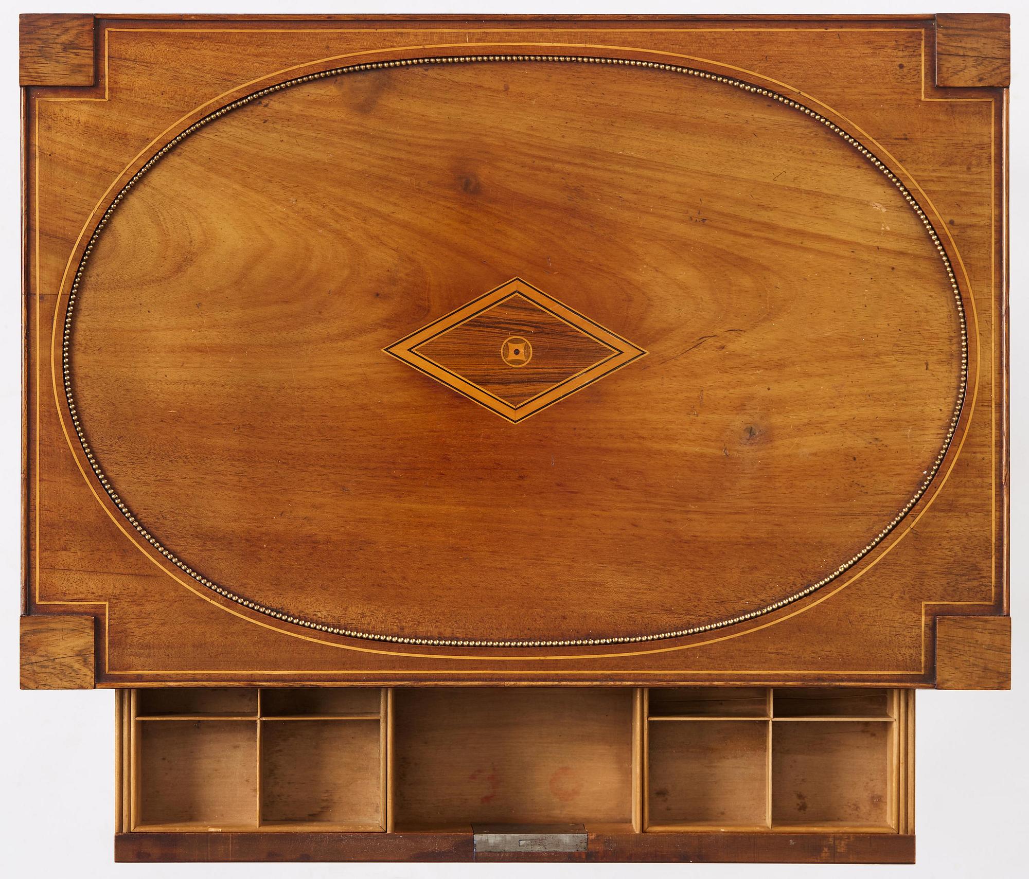 A late Gustavian mahogany parquetry table by L. Qvarnberg '(master in Stockholm 1801-1813).