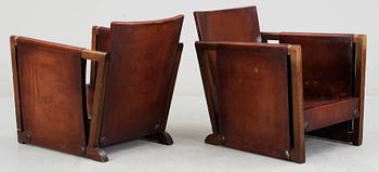 A pair of Axel Einar Hjorth brown leather 'Funkis' armchairs, Nordiska Kompaniet, Sweden ca 1930.