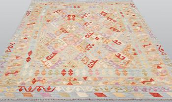 A Kilim carpet, ca 241 x 177 cm.