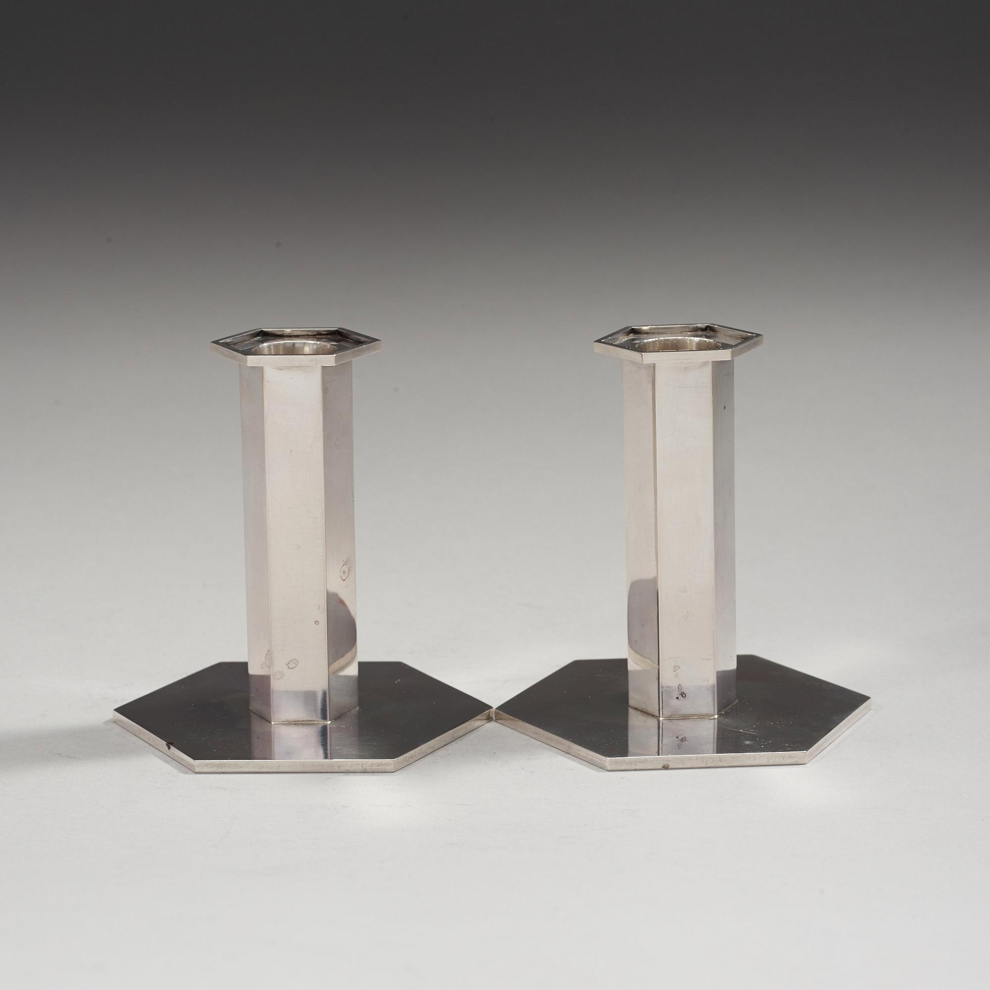 A pair of Wiwen Nilsson sterling candlesticks, Lund 1974.