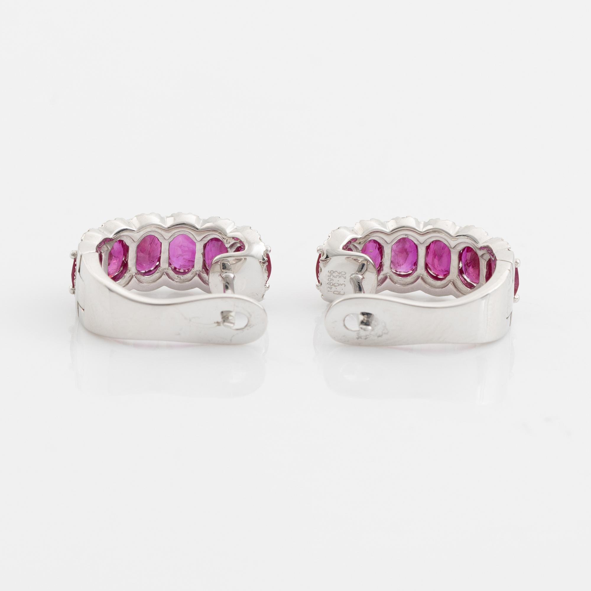 Earrings with rubies and brilliant-cut diamonds.