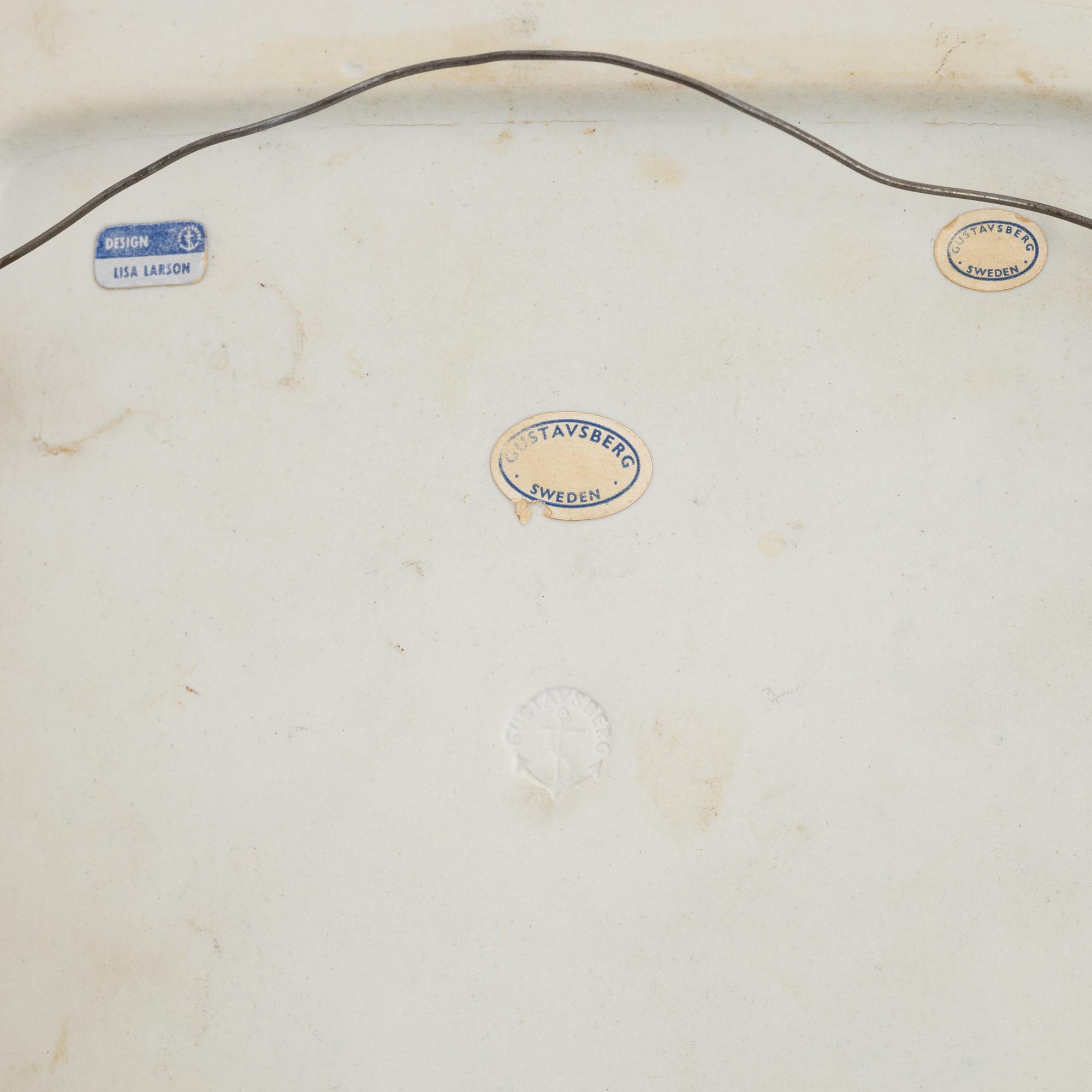 Lisa Larson, a group of three stoneware wall reliefs and two ashtrays, Gustavsberg.