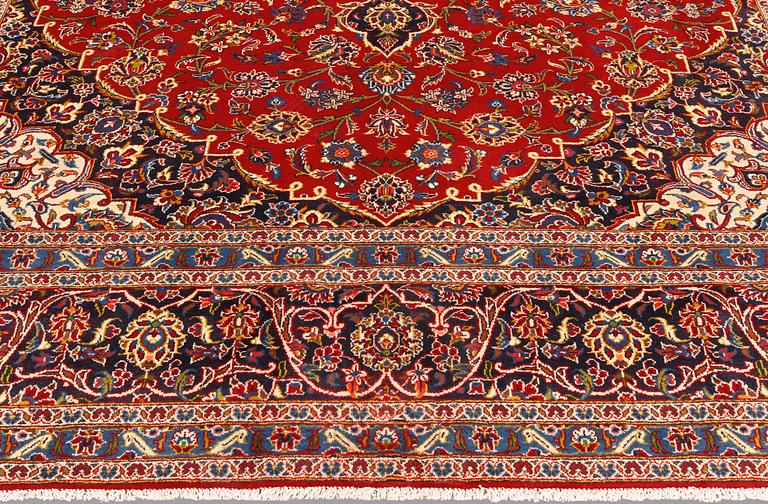 A Keshan carpet, 398 x 298 cm.