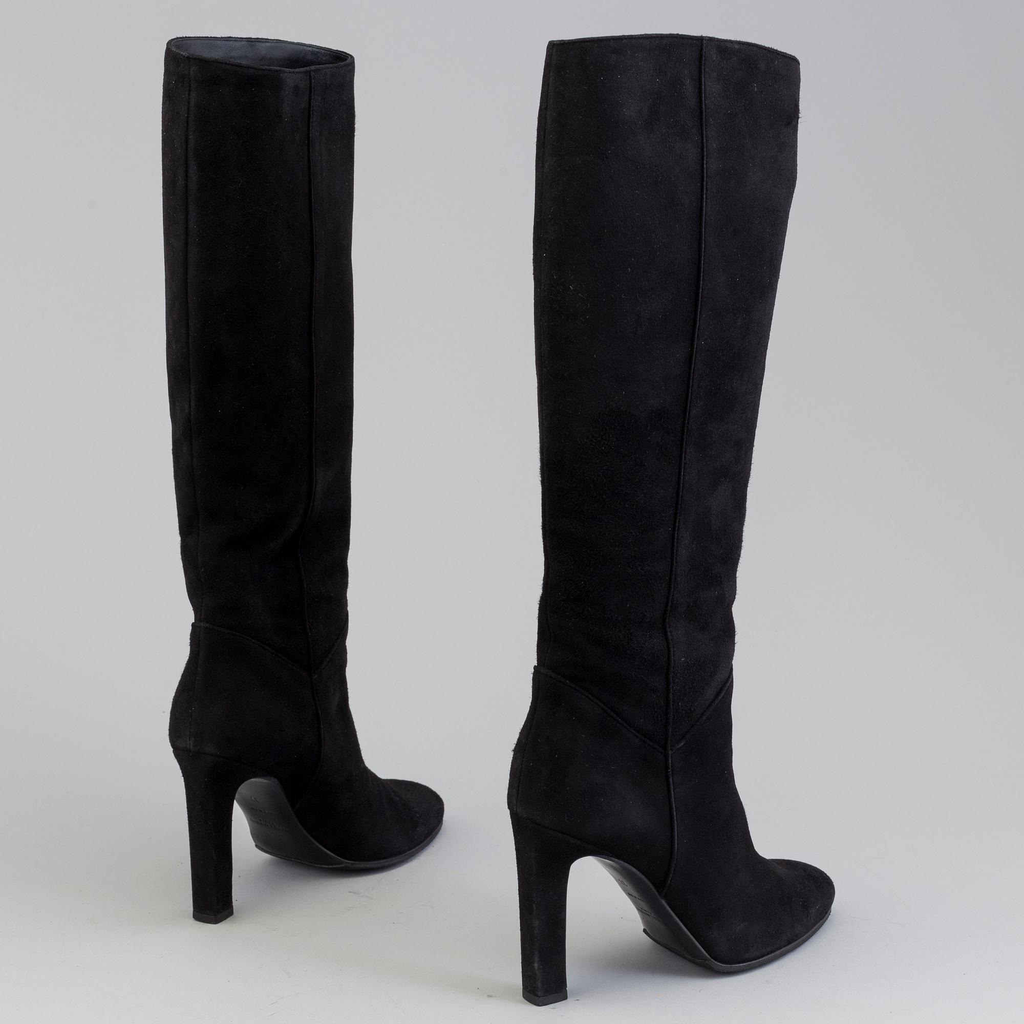 Black suede boots by Yves Saint Lurent.