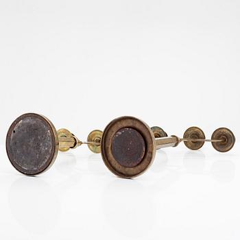 Three brass candlesticks from the early 20th Century.