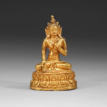 106. A partly gilt and painted Tibeto-Chinese bronze figure of White Tara, 18th Century.