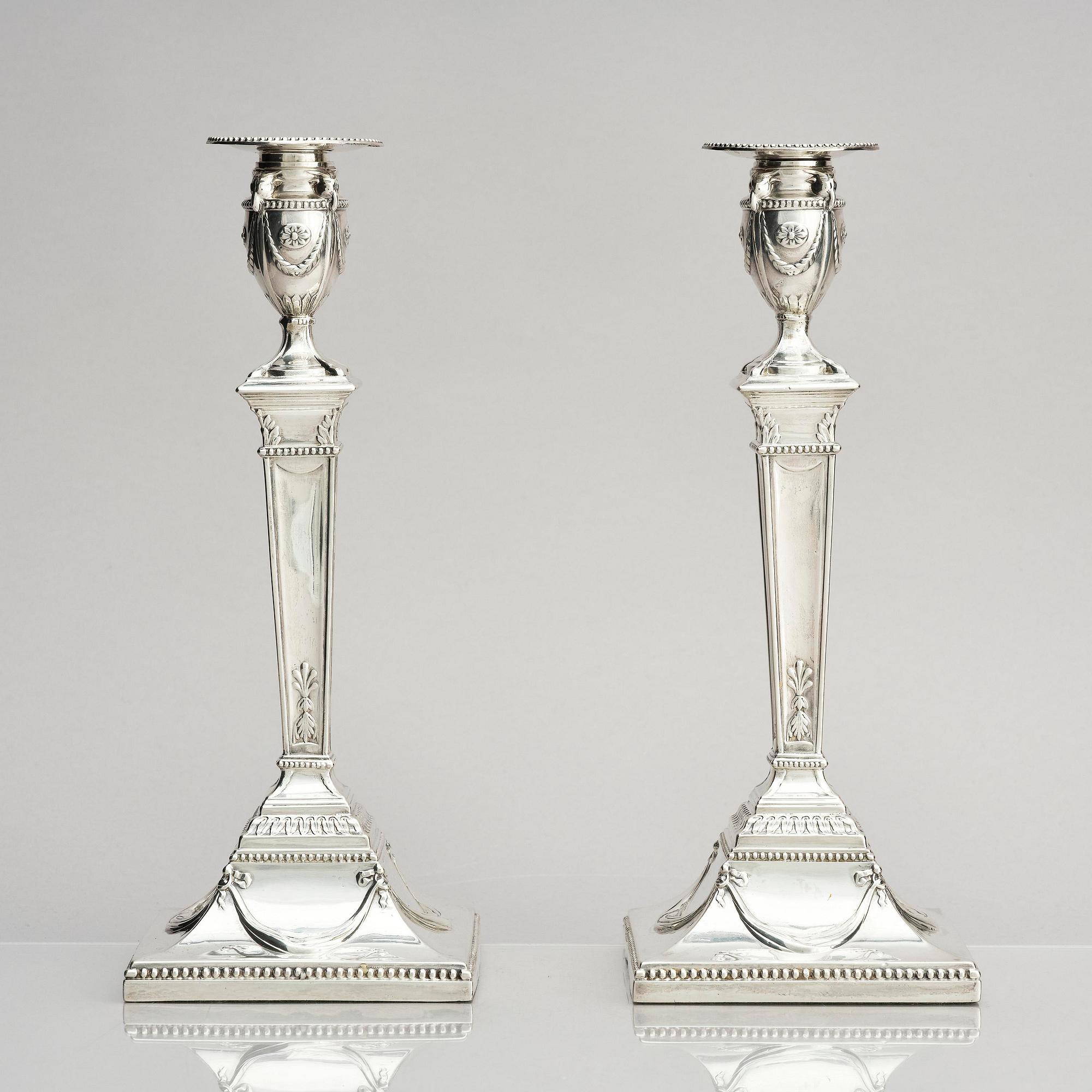 A pair of silver candlesticks, marks of John Parsons & Co, Sheffield, possibly 1784-85.