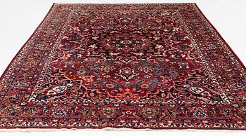 A Persian carpet. ca 400 x 260 cm.