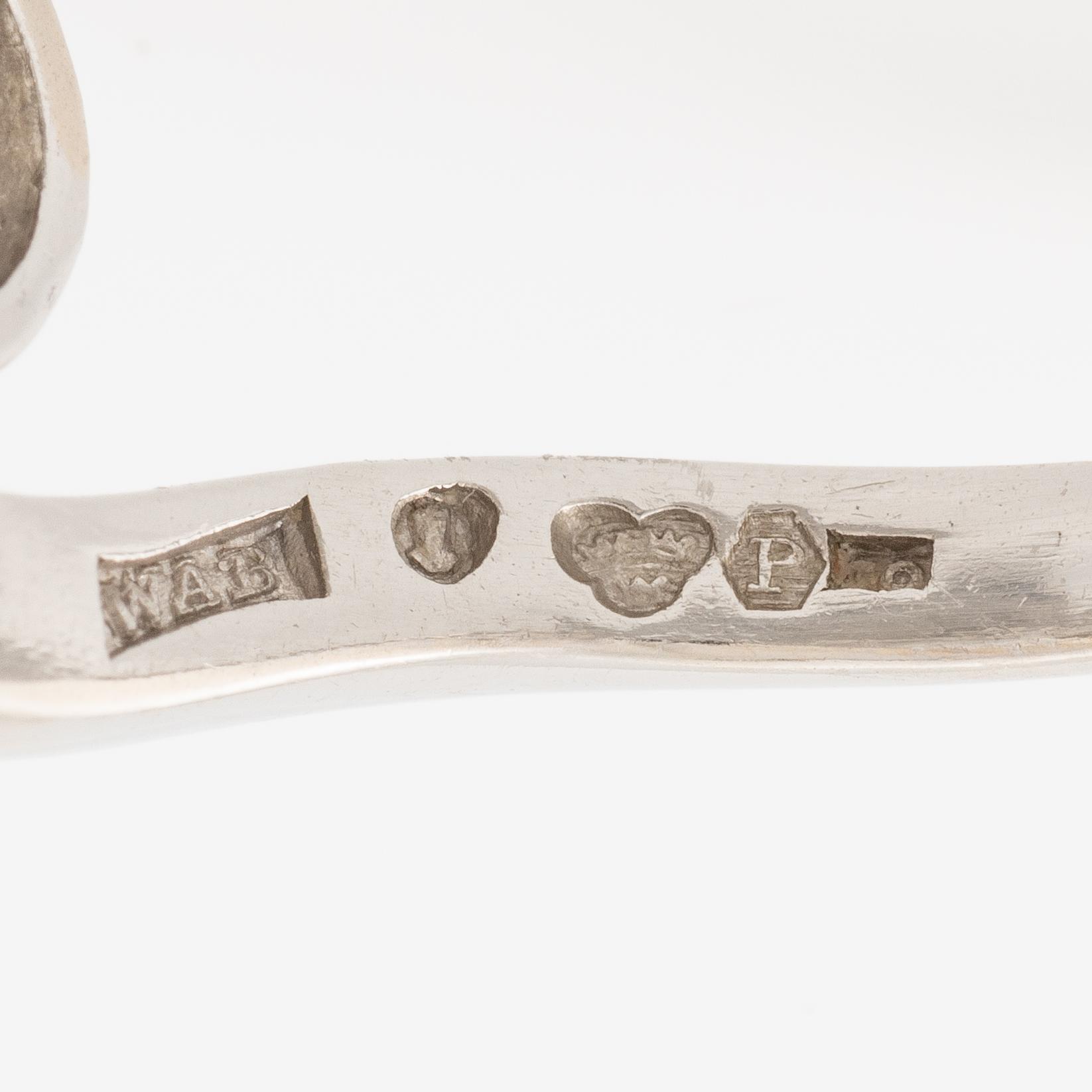 A W.A. Bolin ring in platinum set with two old-cut diamonds.