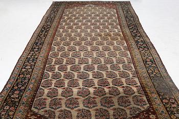 A Bakhtiari carpet, signed, c. 580 x 212 cm.