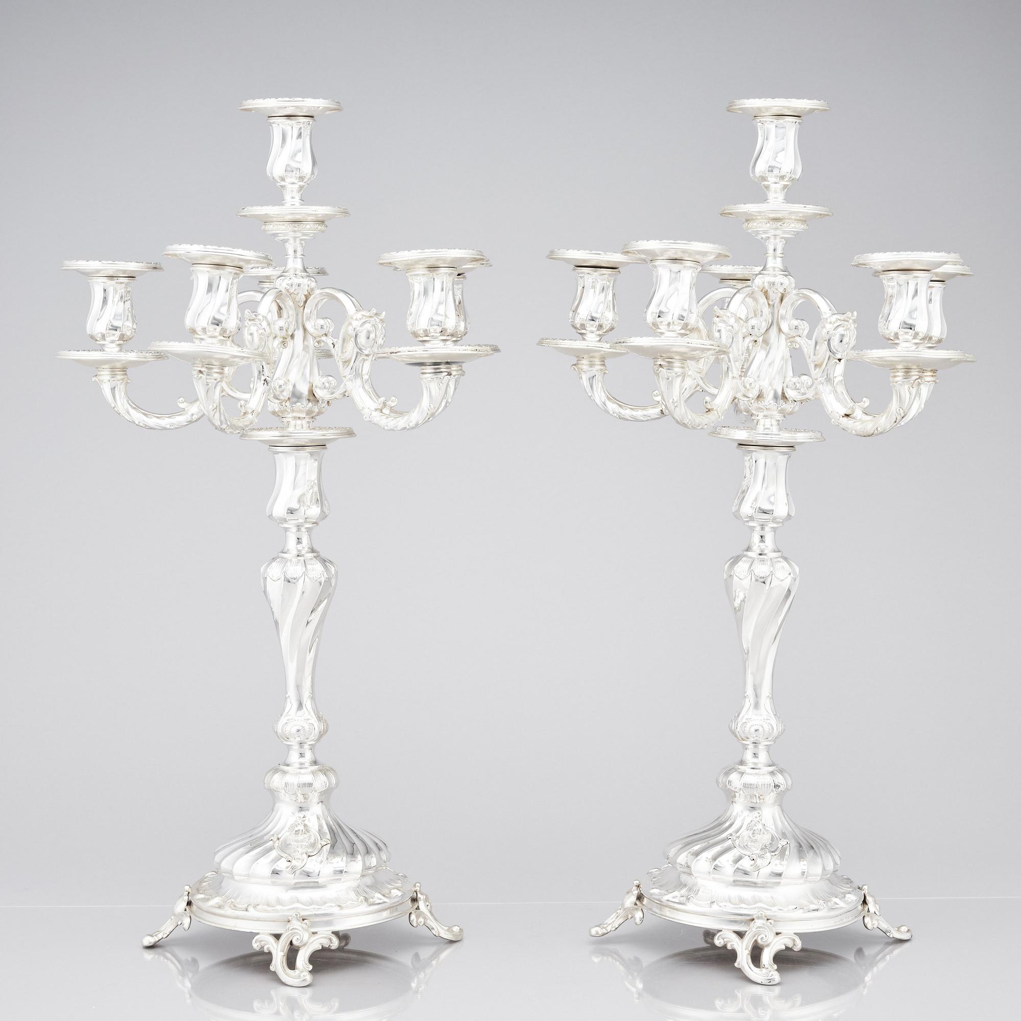 A pair of Swedish silver candelabra, mark of Gustaf Möllenborg (Carl Teodor Feron), Stockholm 1896.