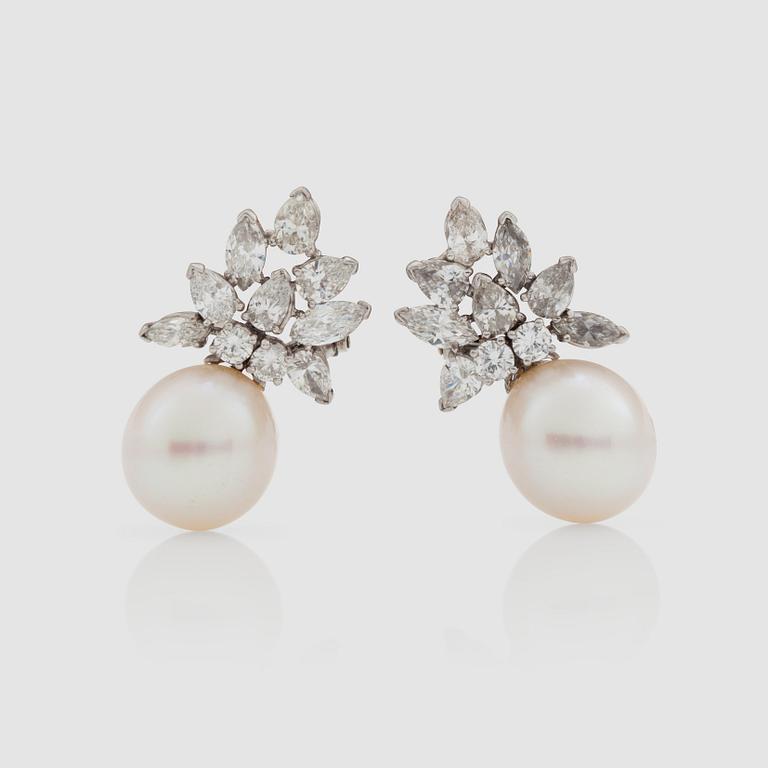 A pair of Van Cleef and Arpels earrings with cultured South sea pearls and diamonds, total carat weight 3.30 ct.