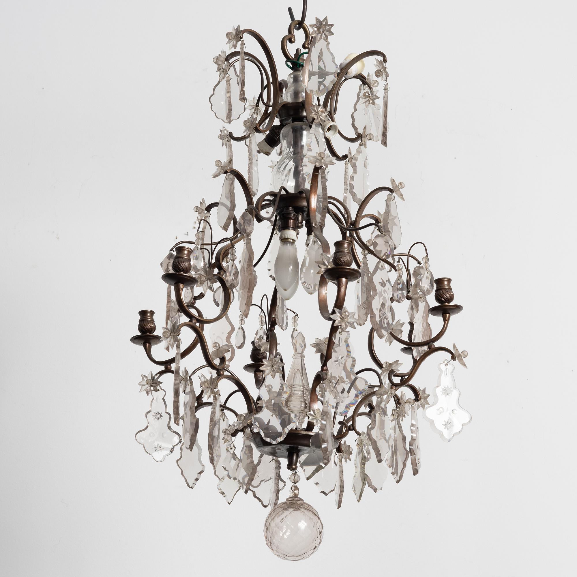 A Rococo style chandelier, early 20th century.