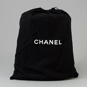 A red caviar "Classic Maxi" handbag by Chanel 2009-2010.