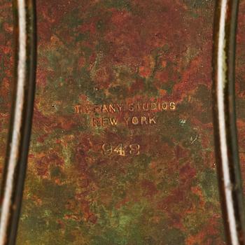Louis Comfort Tiffany / Tiffany Studios, an Art Nouveau bronze and marbled "Pine needles" glass frame model "948", New York.