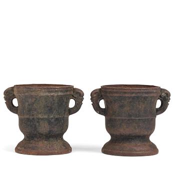 244. A pair of Swedish cast-iron garden urns, 18th century.