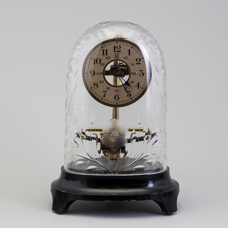 A forst haöf of the 20th century Bulle table clock.