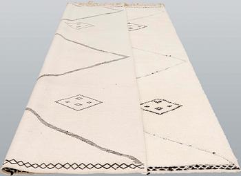 A moroccan carpet, ca 300 x 200 cm.