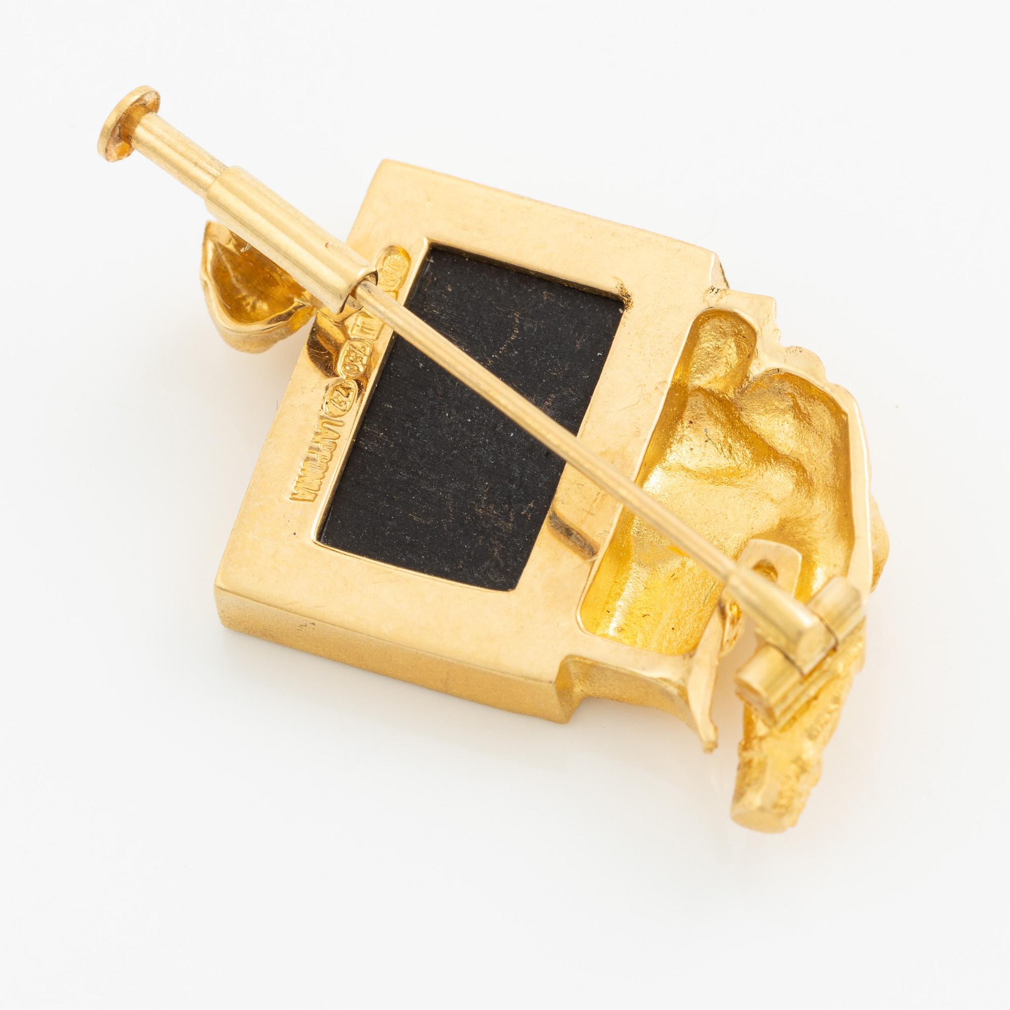 Björn Weckström, brosch, 18K guld med blå sten (sannolikt opal), Finland 1977. För Lapponia.