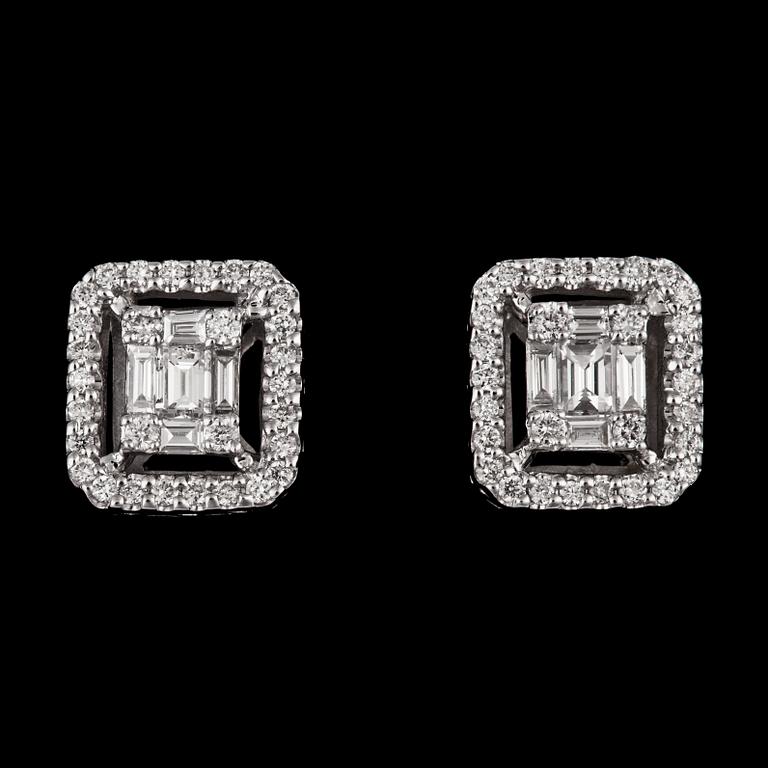 A pair of brilliant cut diamond earrings, tot. 0.57 cts.