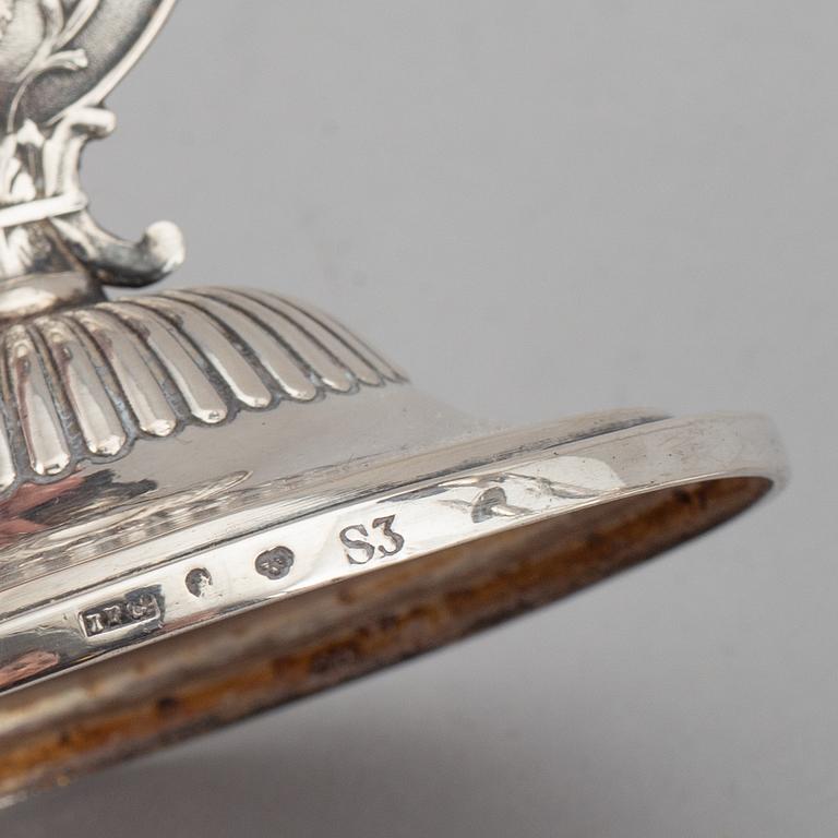 A Swedish 19th century matched set of four silver candlesticks, mark of Johan Petter Grönvall, Stockholm 1824.