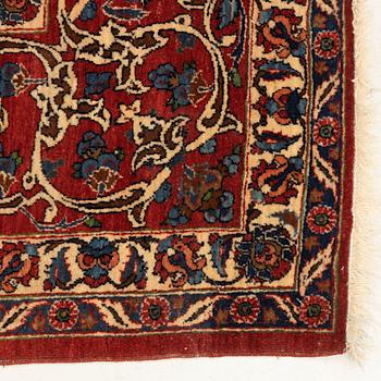 A semi-antique Isfahan rug, central Persia, c. 305 x 205 cm.