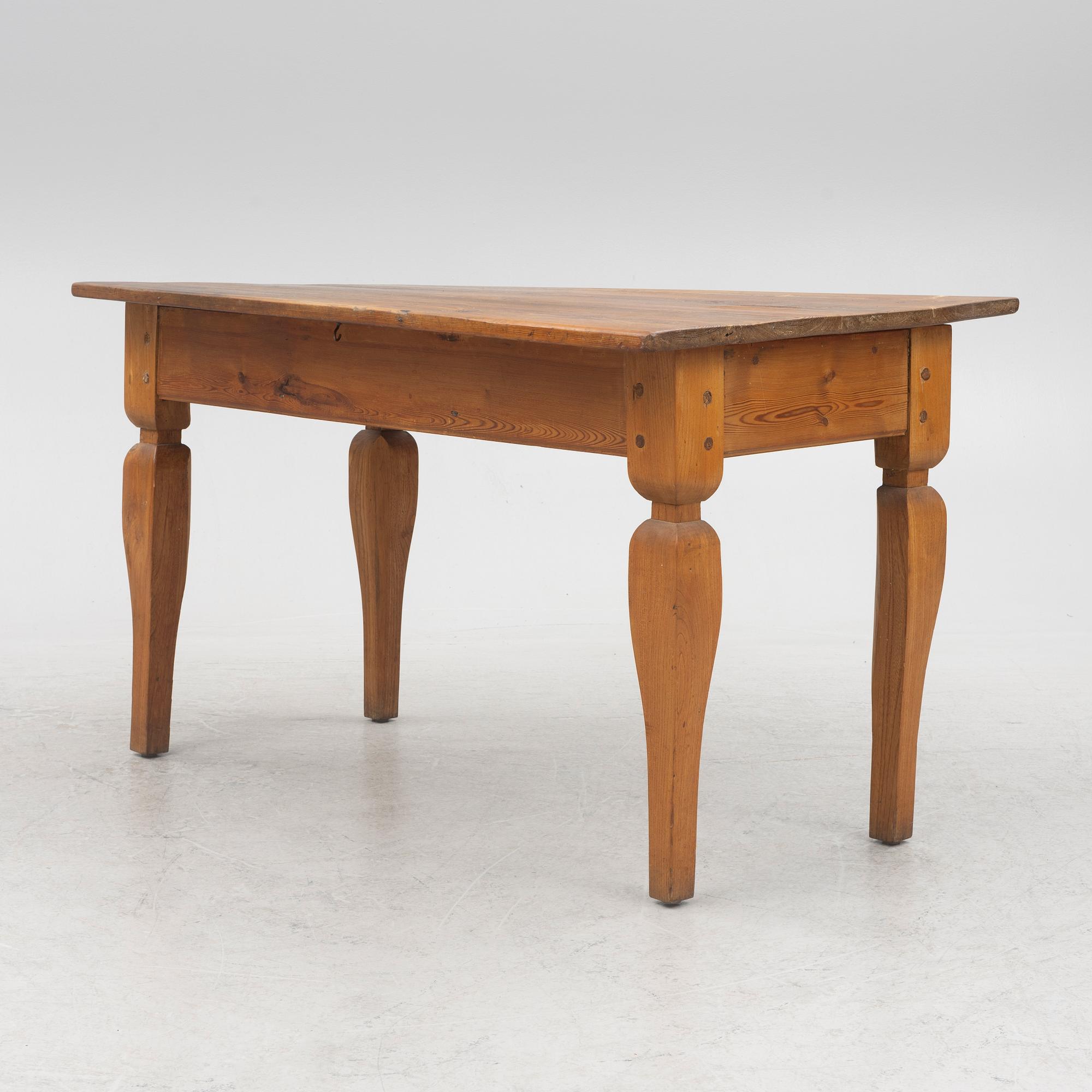 A 19th Century Dining Table.