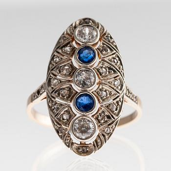 A RING, 14K gold, old- and rose cut diamonds c. 0,75 ct, sapphires. Size 17,5. Weight 5 g.