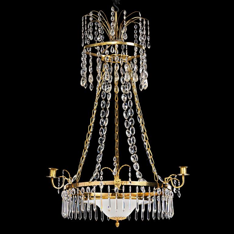 A late Gustavian gilt brass and cut glass four-light chandelier, Stockholm, late 18th century.