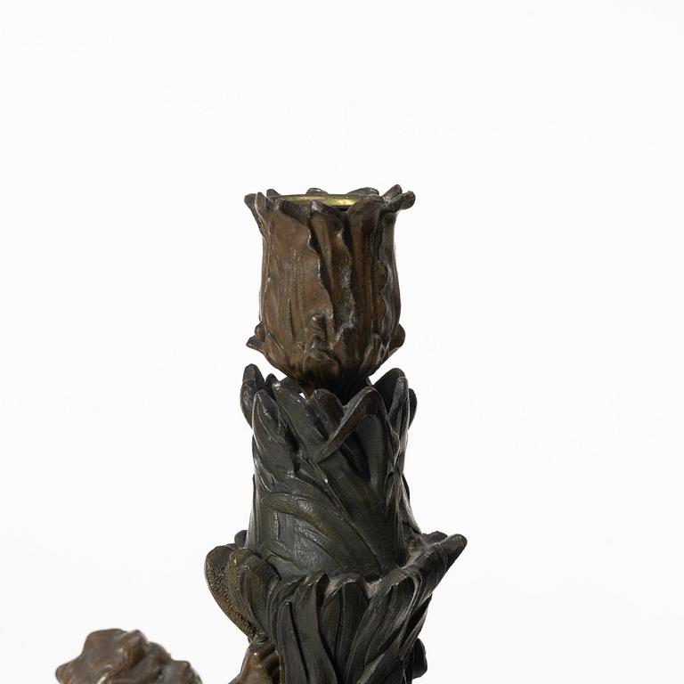 a pair of bronze and marble candle sticks, after a model by Houdon, late 19th century.