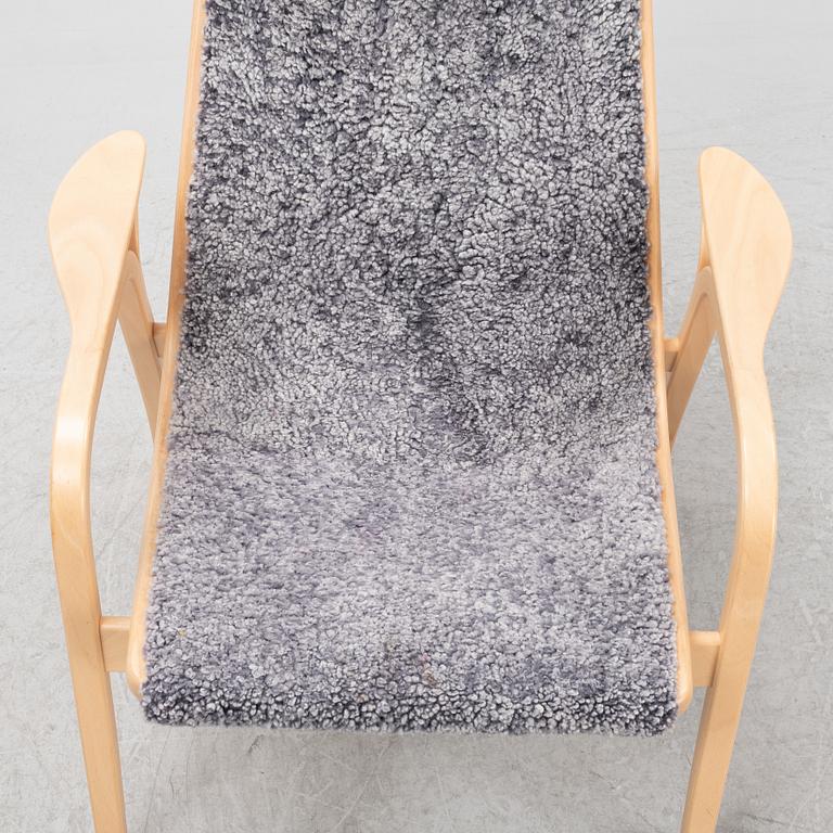 Yngve Ekström, A 'Lamino' easy chair with stool, Swedese.