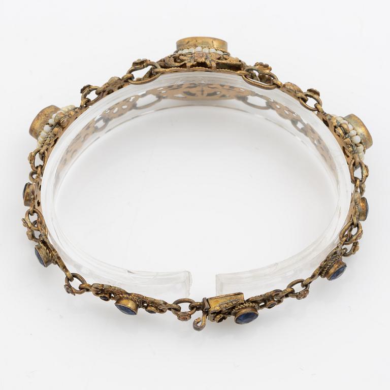 Bracelet, gilded silver with synthetic blue stones.