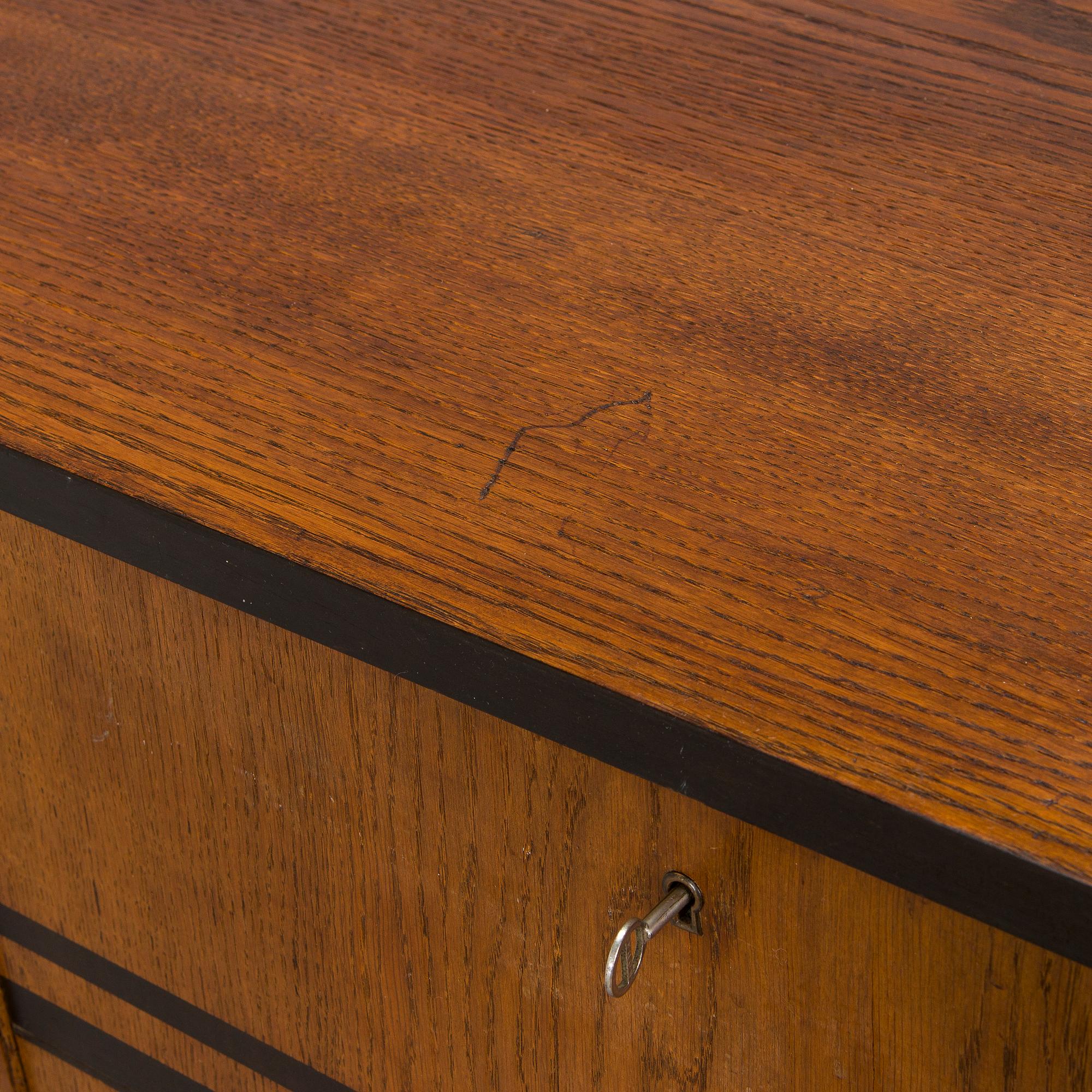 A 1930s functionalist style sideboard.