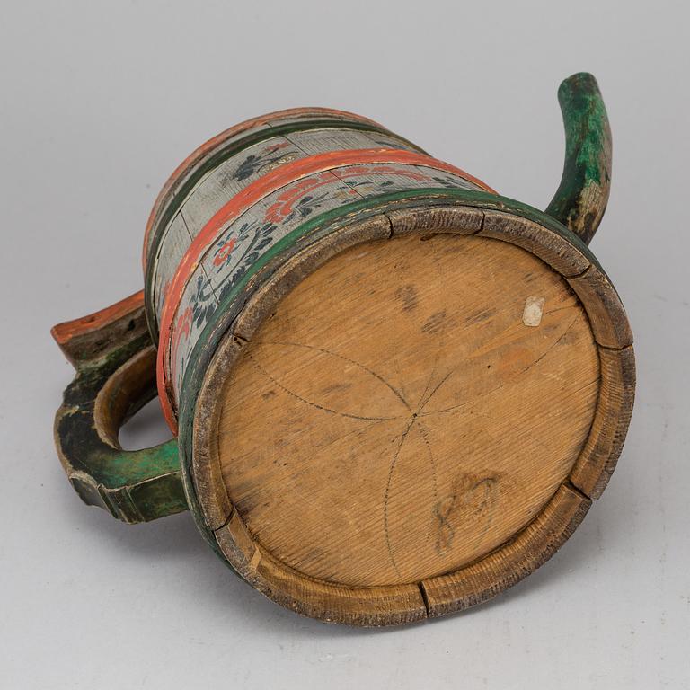A painted wooden jar from the 19th century.