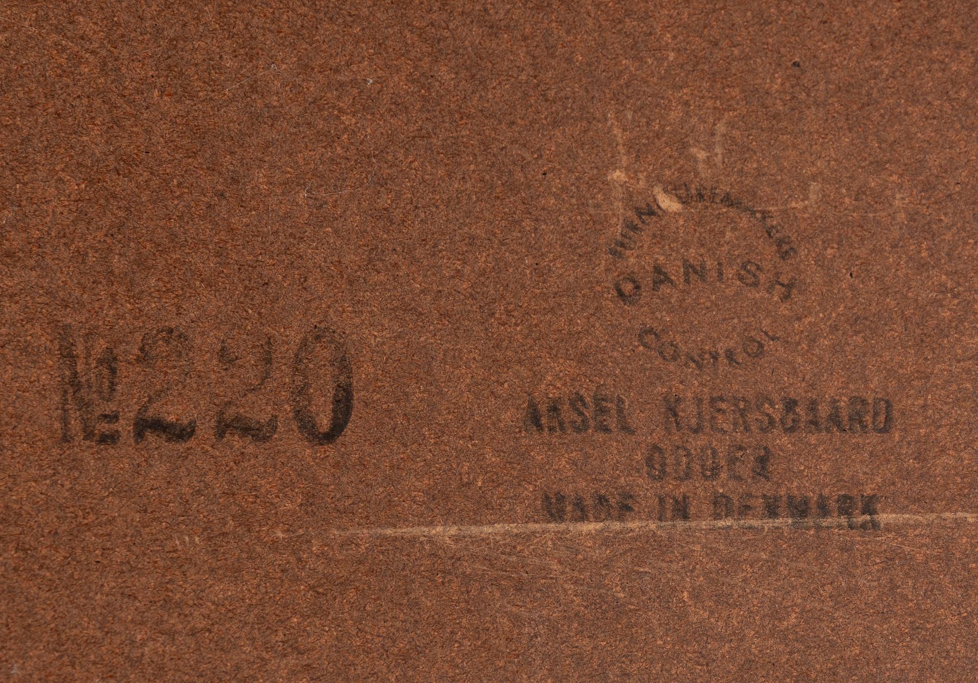 AKSEL KJERSGAARD, a rosewood mirror and chest of drawers from Odder, Denmark, 1960's.