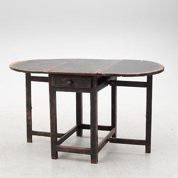 A Swedish wooden table, 19th century.