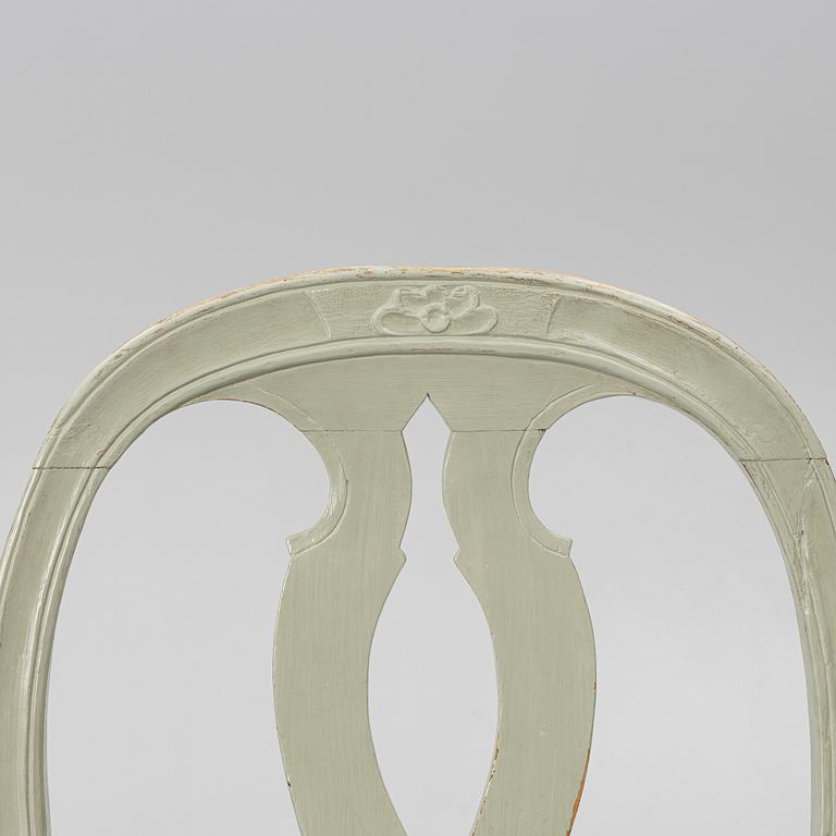 Ten similar Gustavian chairs, Sweden, around the year 1800.