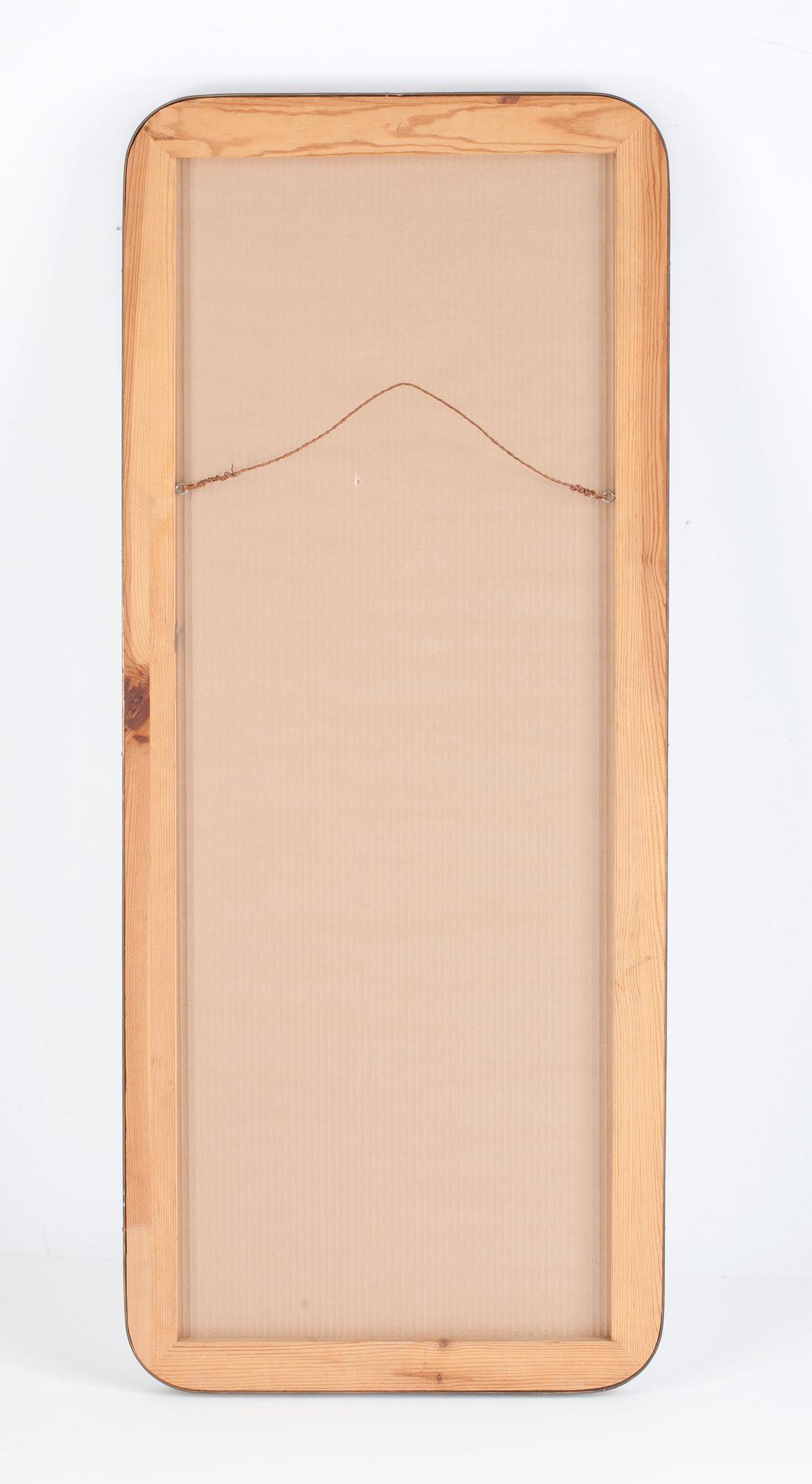 A brass mirror, possibly by Josef Frank for Svenskt Tenn.