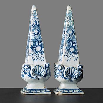 20. A pair of Swedish faience obelisques, Rörstrand, 18th Century, marked Stockholm.