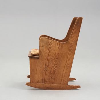 Axel Einar Hjorth, a stained pine "Lovö" rocking chair, Nordiska Kompaniet, Sweden 1930's.