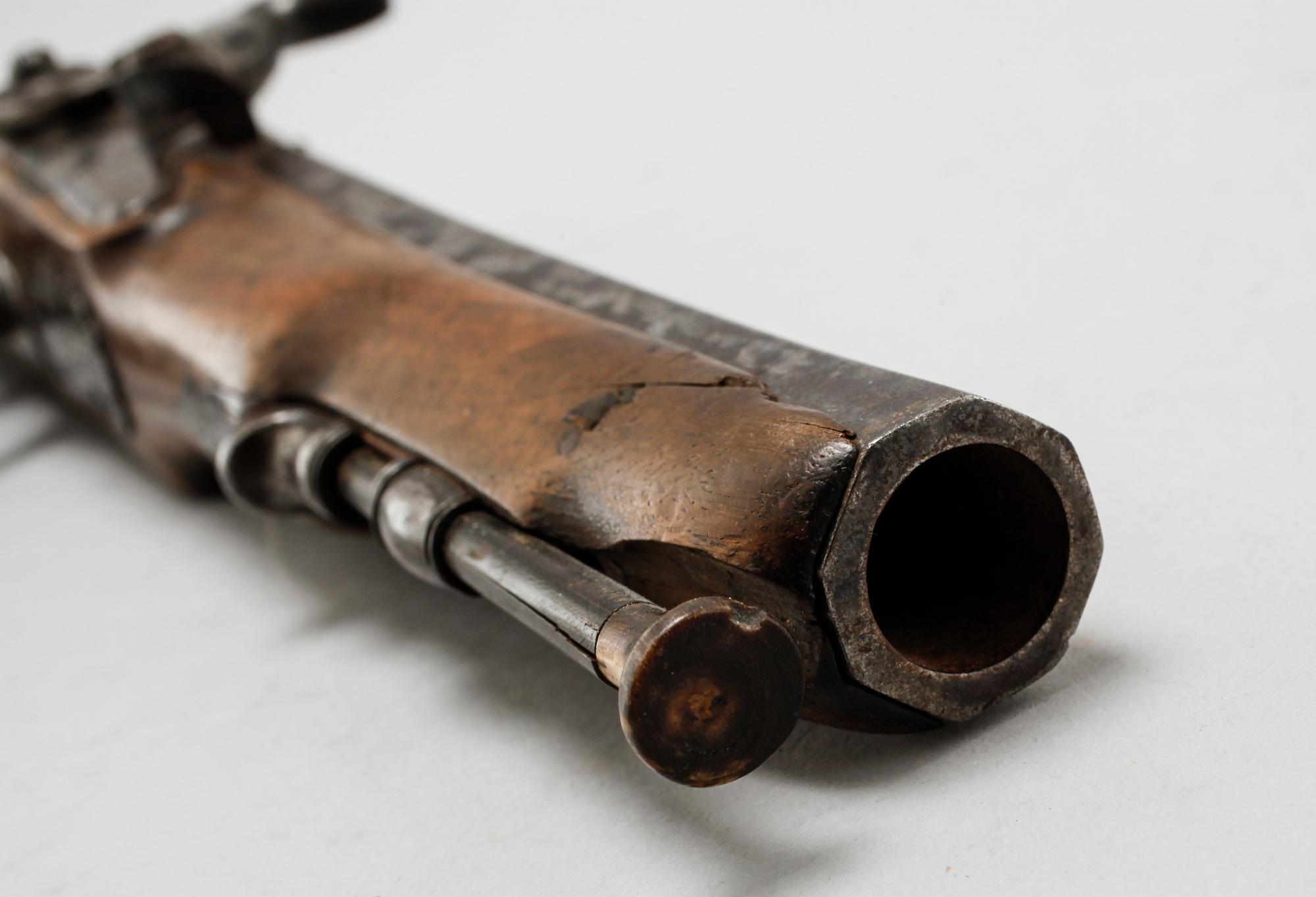 A pair of percussion guns, around the mid 19th century.