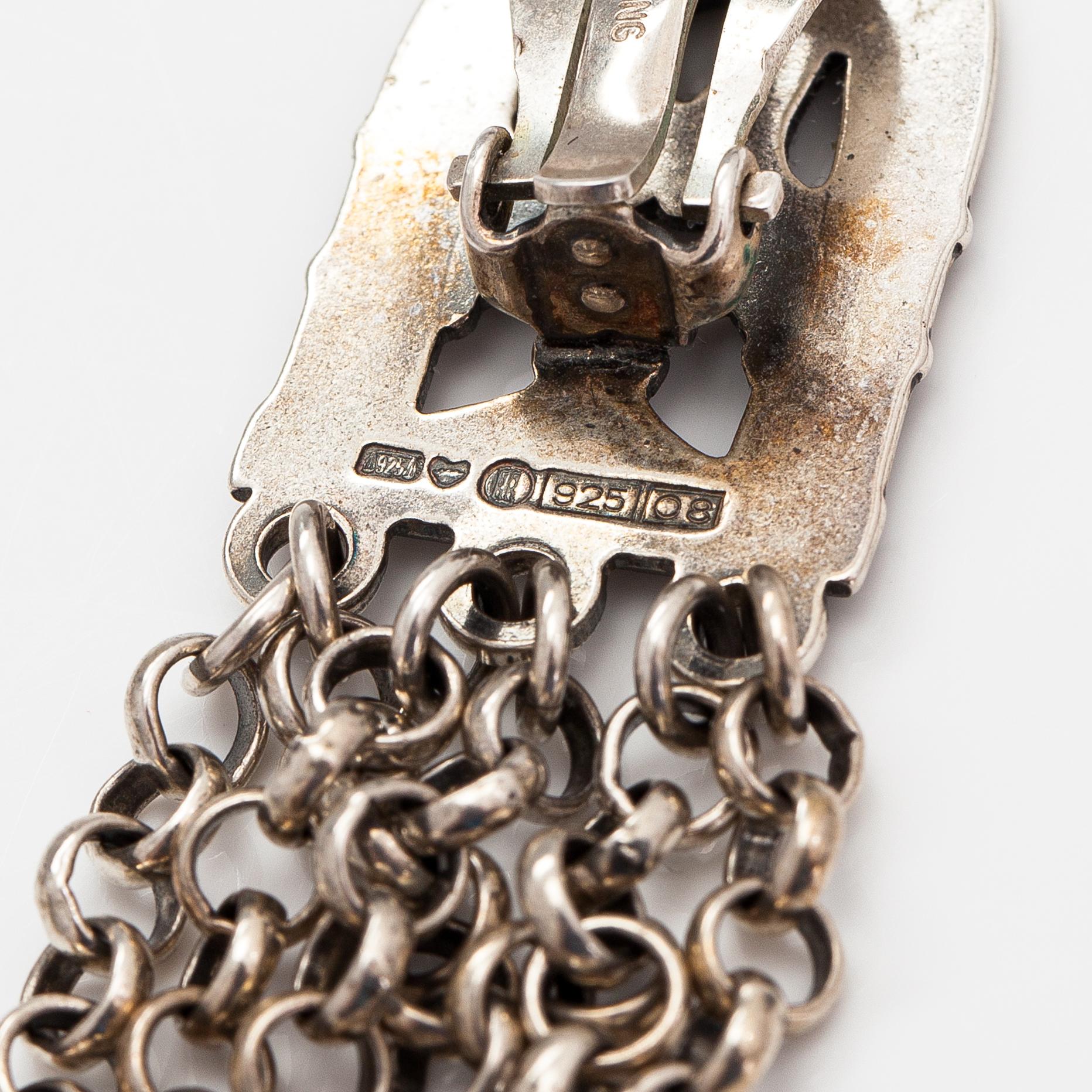 A set of "Paradise" necklace, bracelet and earrings made of sterling silver. Kalevala Koru, Helsinki 1991-1995.