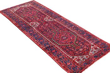 A Hosseinabad runner carpet, c. 391 x 135 cm.