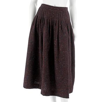 416. YVES SAINT LAURENT, a wool skirt, size 40.