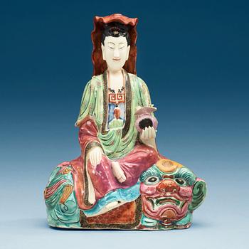 1614. A famille rose figure of Guanyin, Qing dynasty, 19th Century.