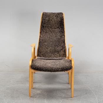 A 'Lamino' easy chair and stool by Yngve Ekström for Swedese, designed 1957.