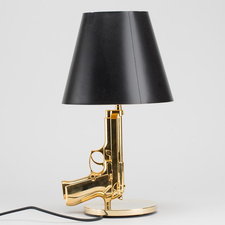 PHILIPPE STARCK, a Flos "Gun Bedside Lamp".