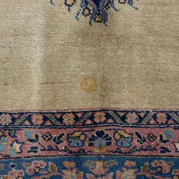 A semi-antique Kerman carpet, figural, c. 371 x 285 cm.